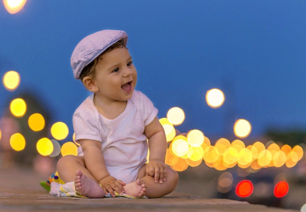 Cute little baby and night lights