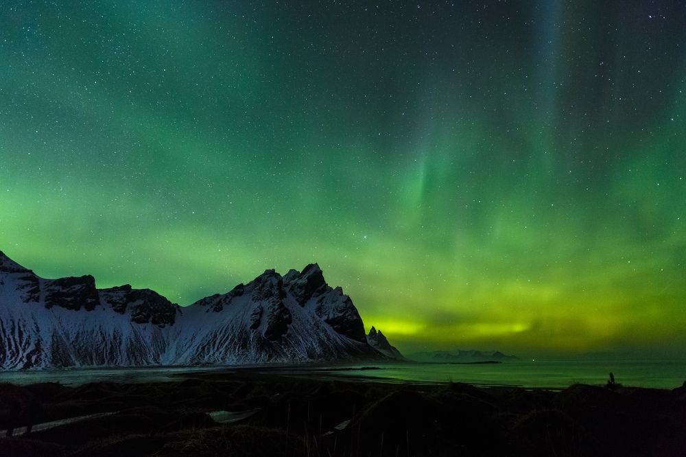Iceland, Aurora borealis over the Stockness