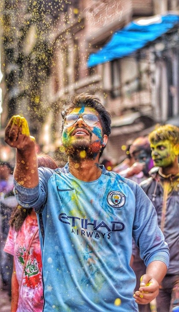 The happiness and joy you can see in peoples faces at Holi Festival.