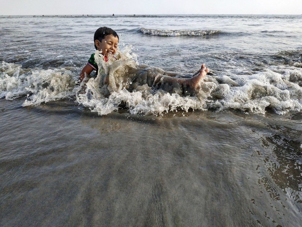 1st beach experience of a kid
