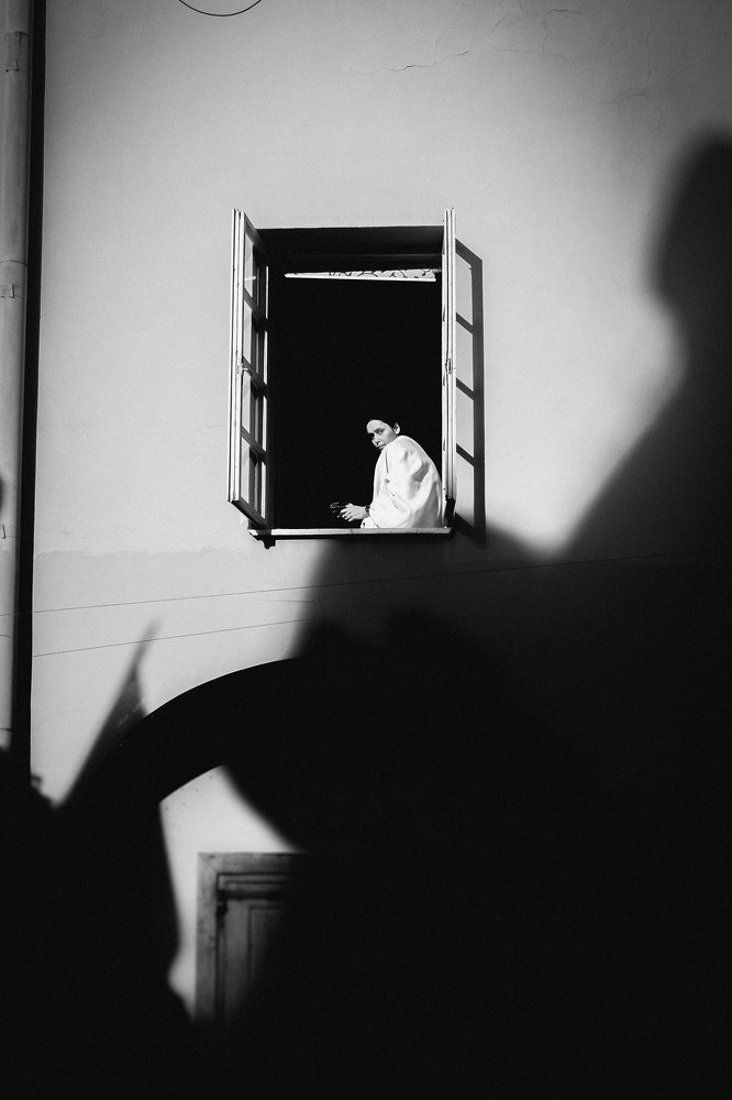 Cigarette by the window