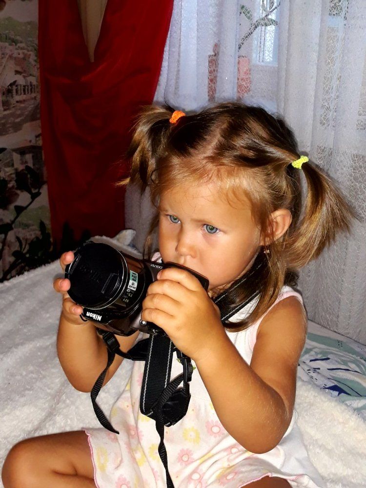 Юный фотограф