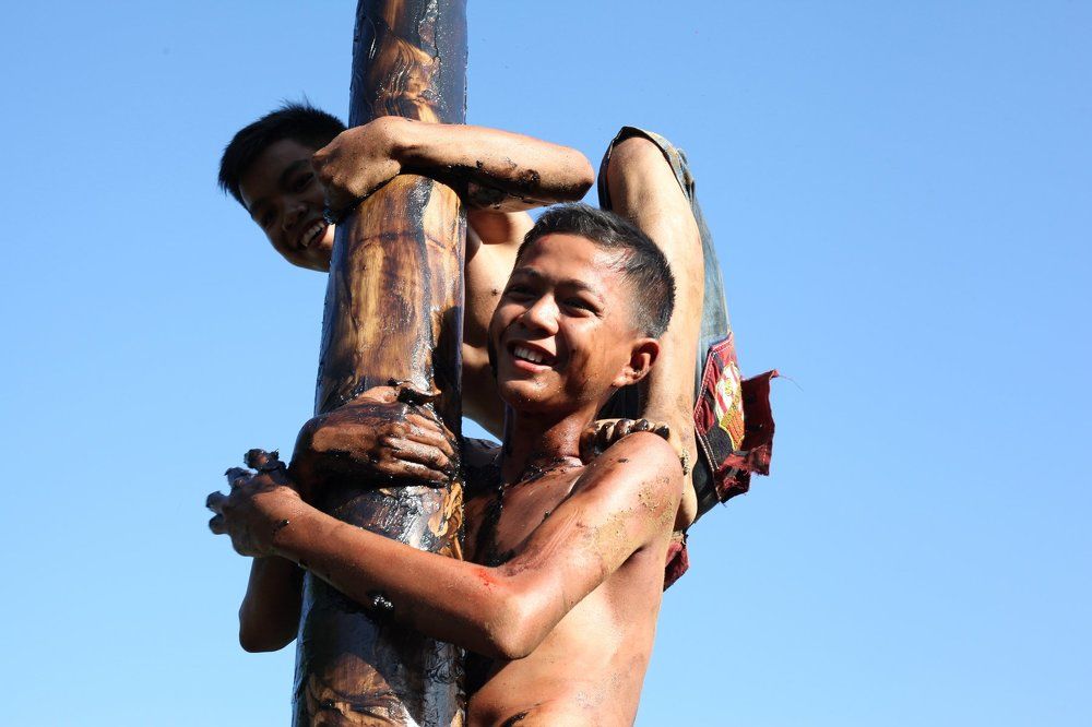 Climbing slippery pole