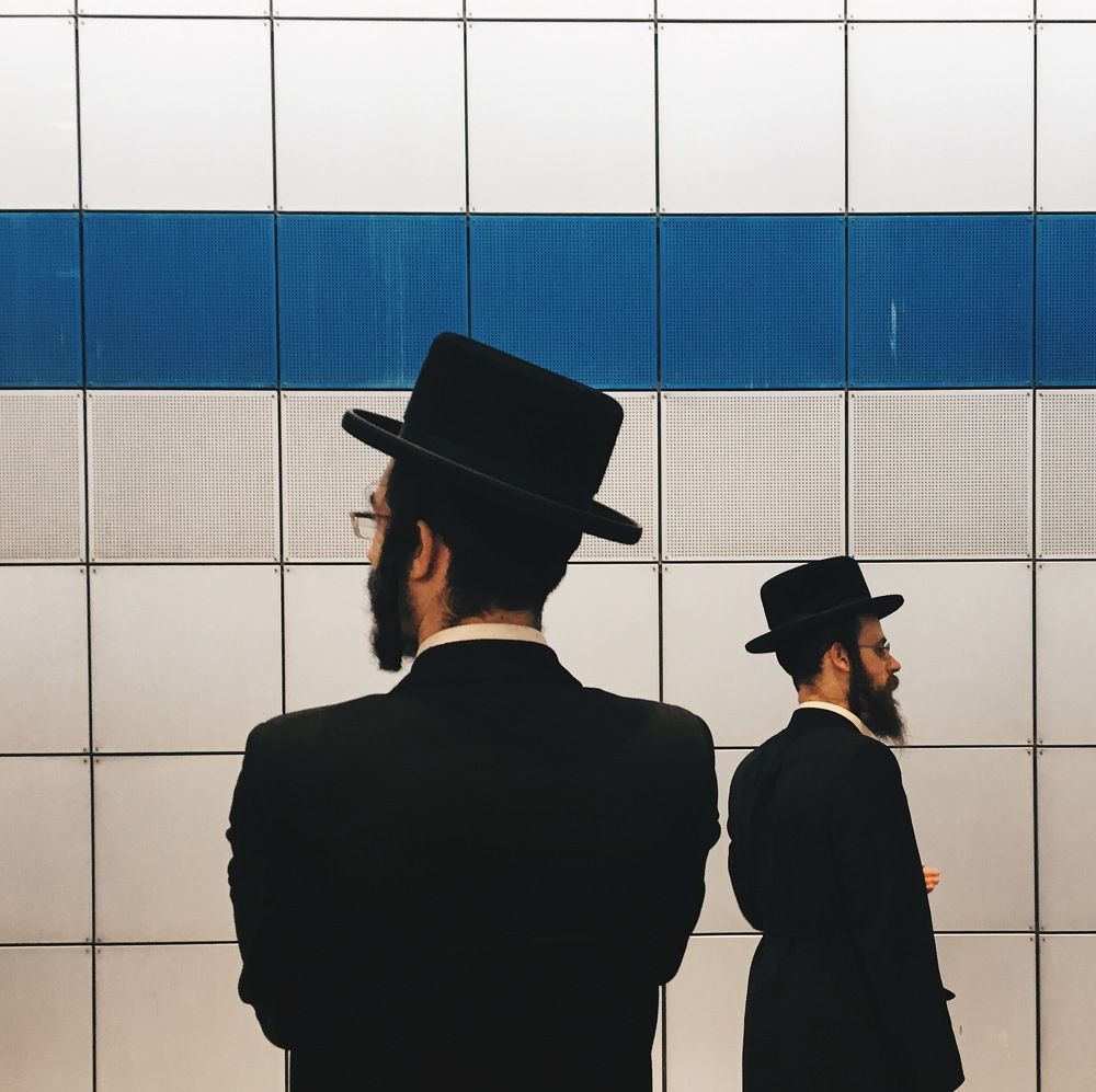 people in black hats