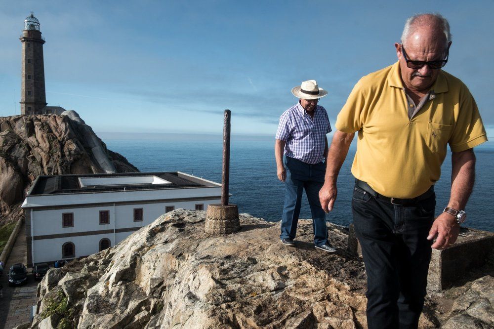 men on the rocks