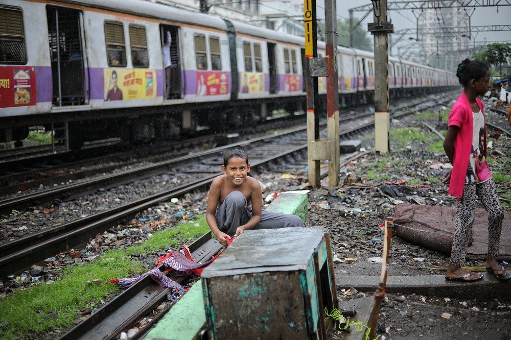 Washing Clothes On Railway Track Side
