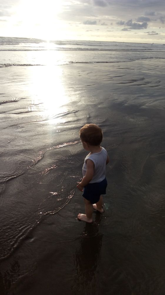 Playing on the beach with sunset