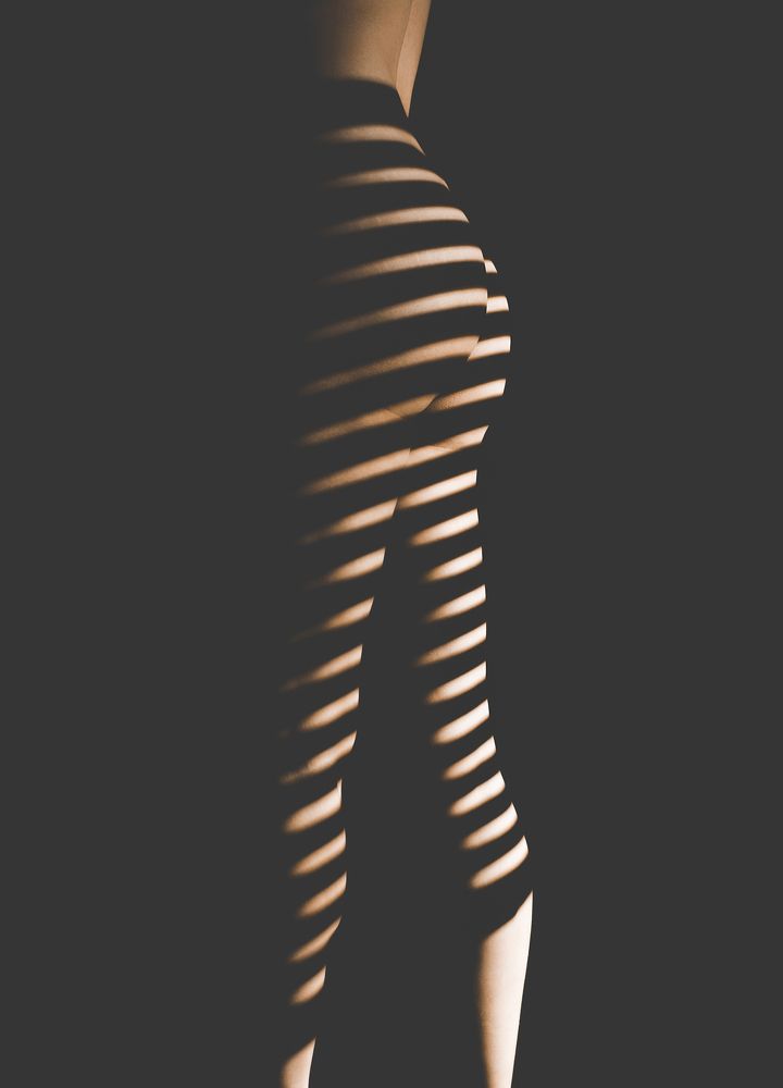 Woman tights from the shadows