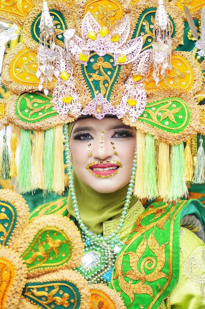 Beautiful Indonesian women with traditional cultural costumes