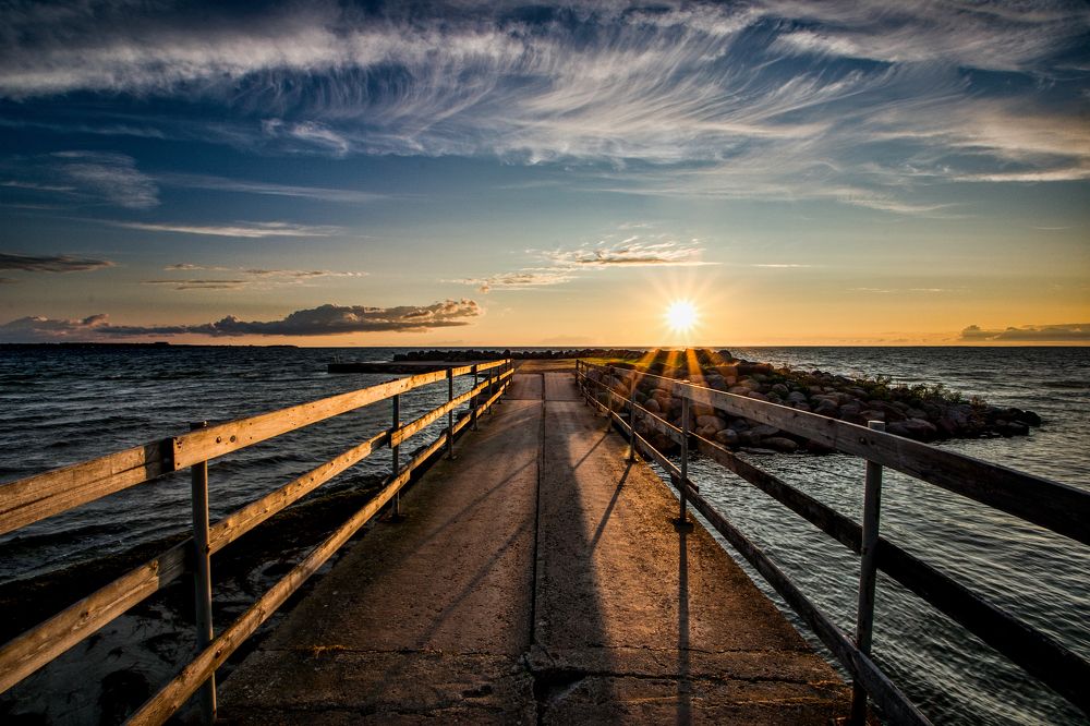 Sun above pier