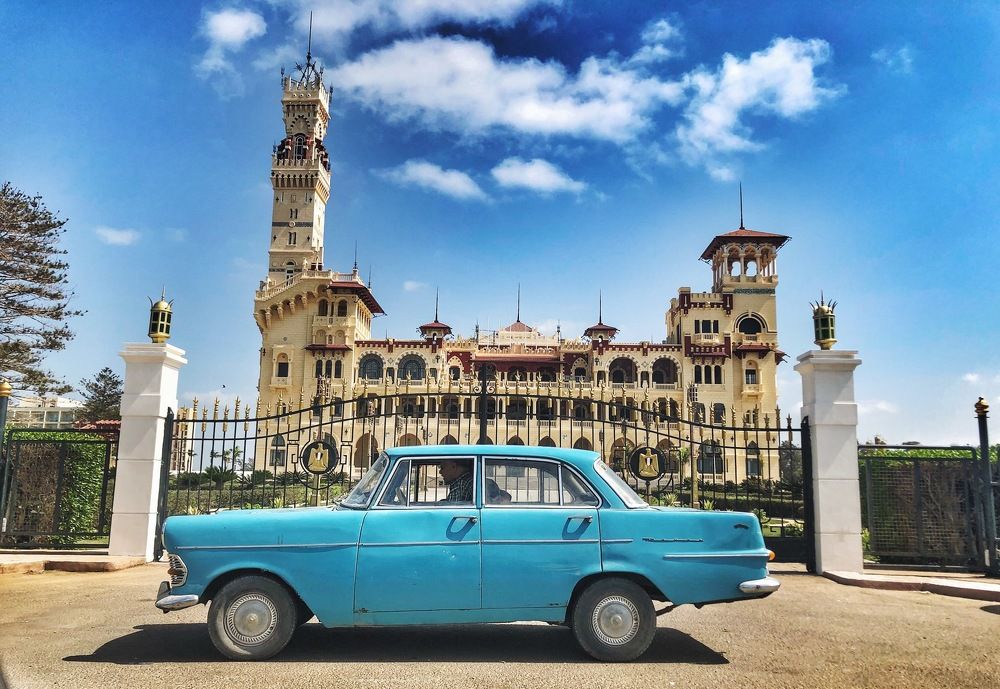 Blue car and the palace