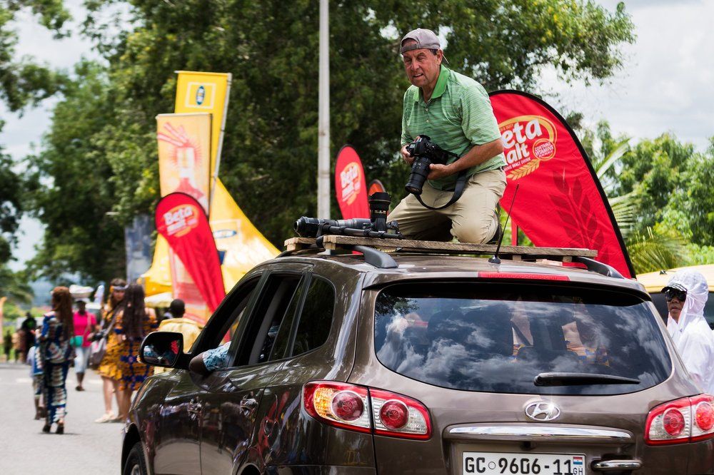 Photographer on a vehicle