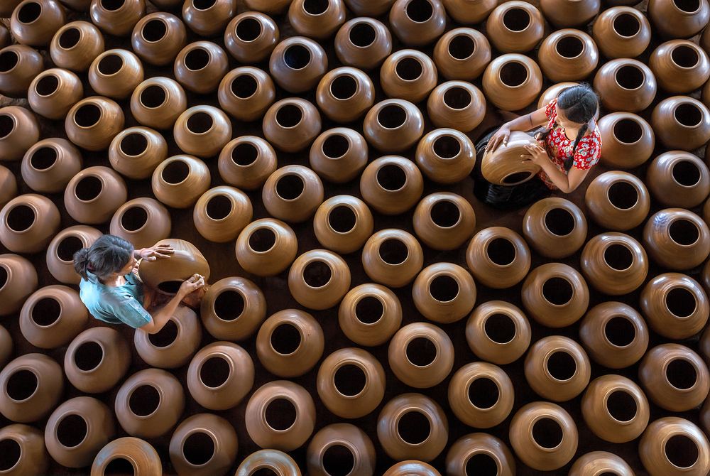 craftsmanship of myanmar women pottery
