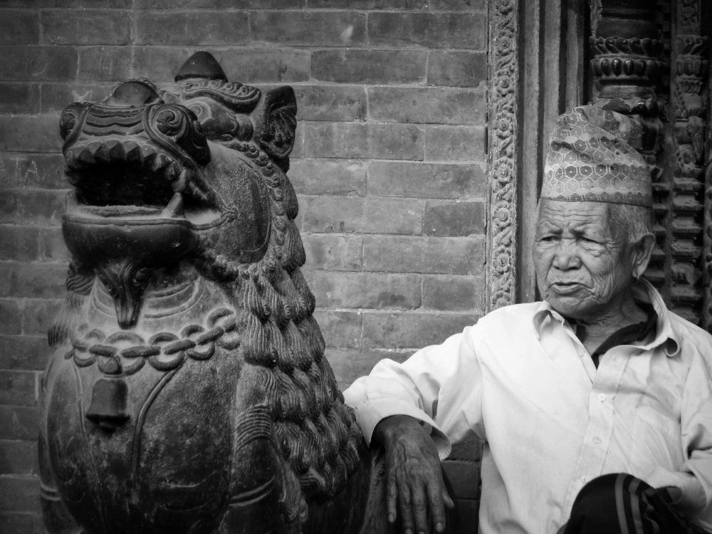 Portrait of Male with stone lion