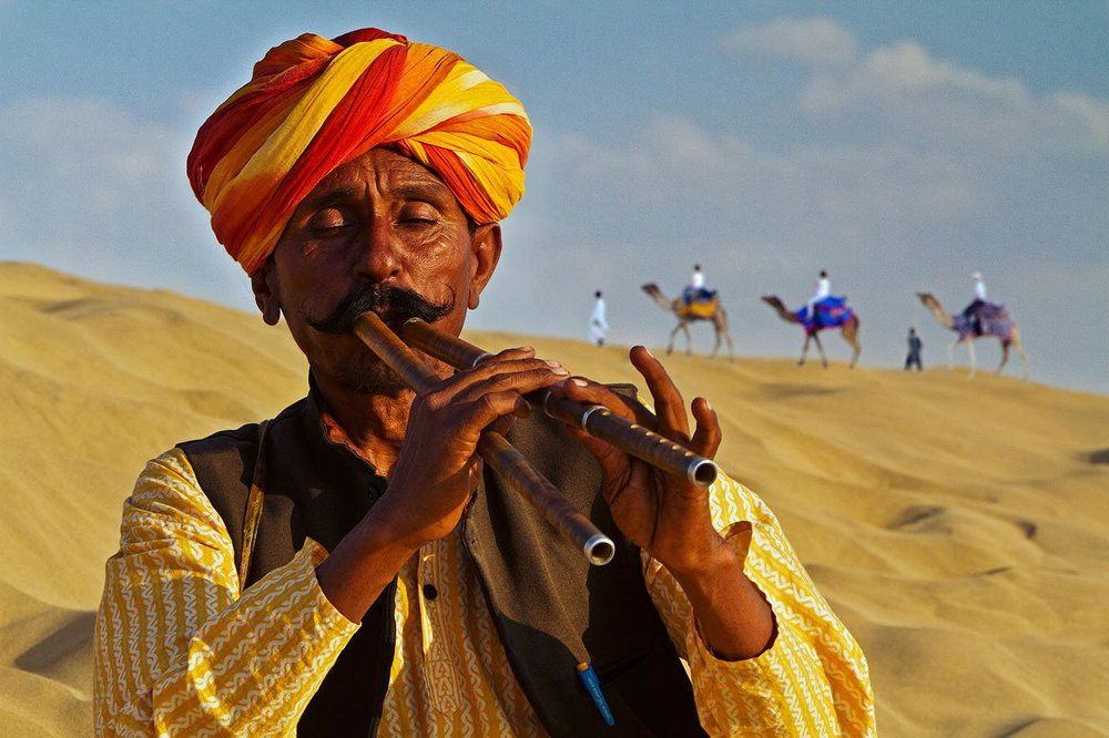 Flutist Of Sam Sand Dunes