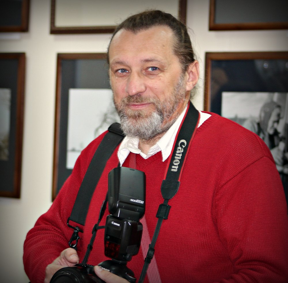 Фотограф.