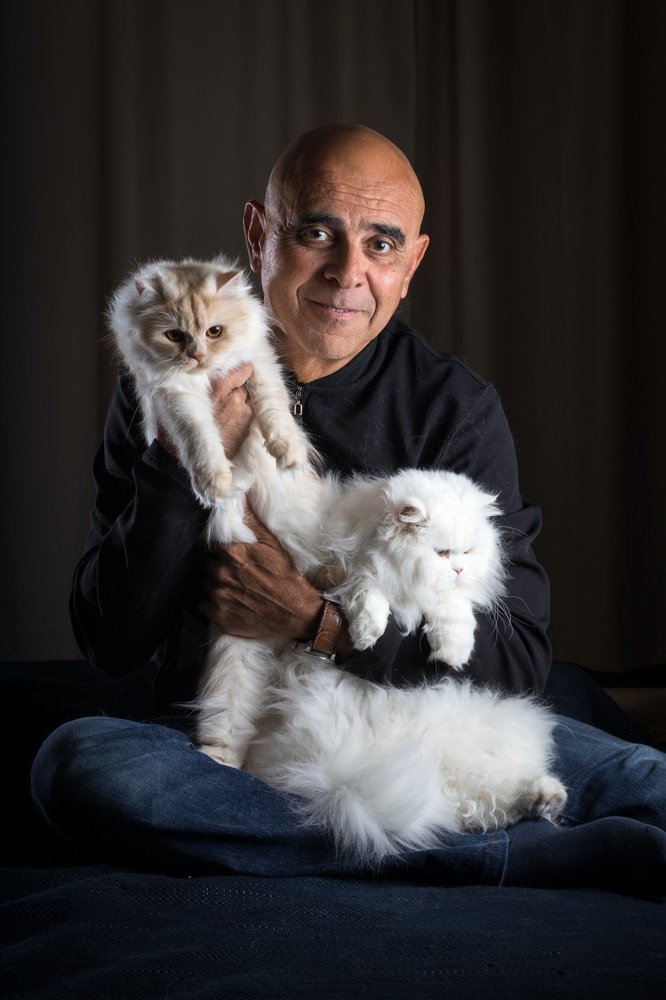 Men with persian cats