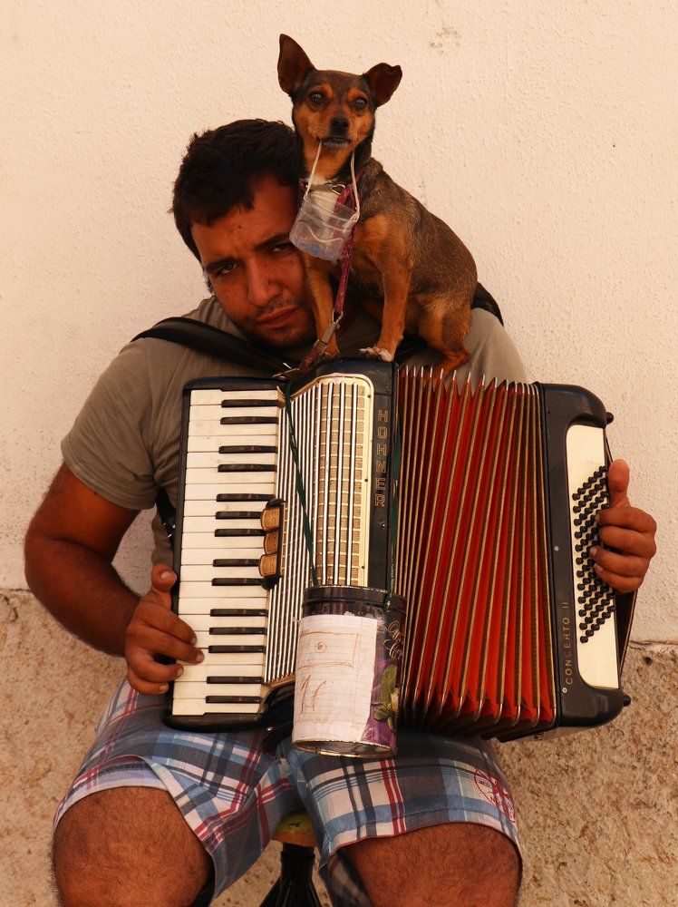 The Busker And His Assistant