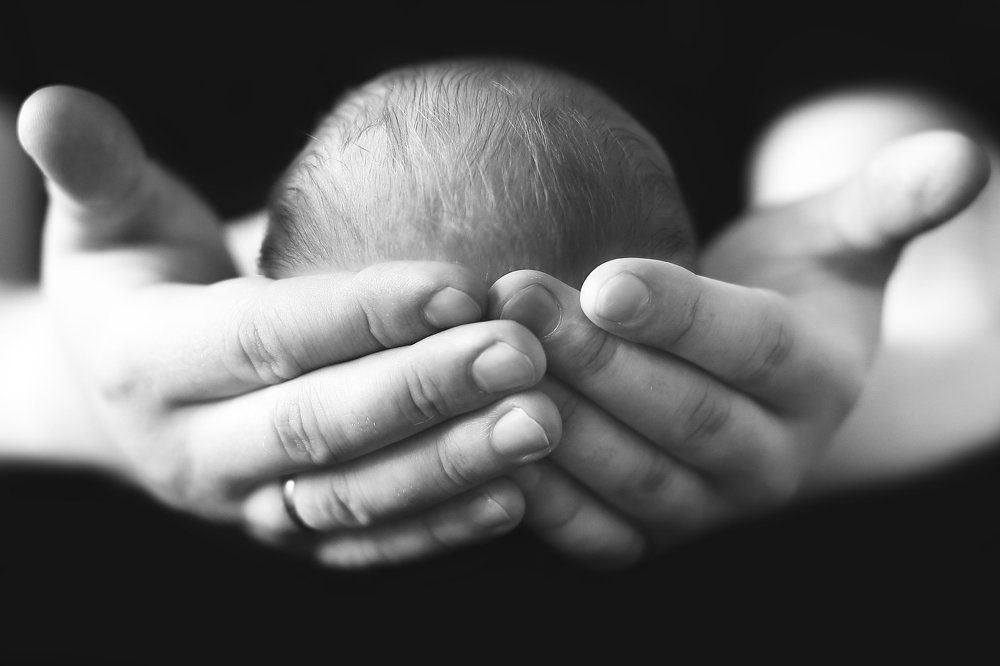 В руках отца