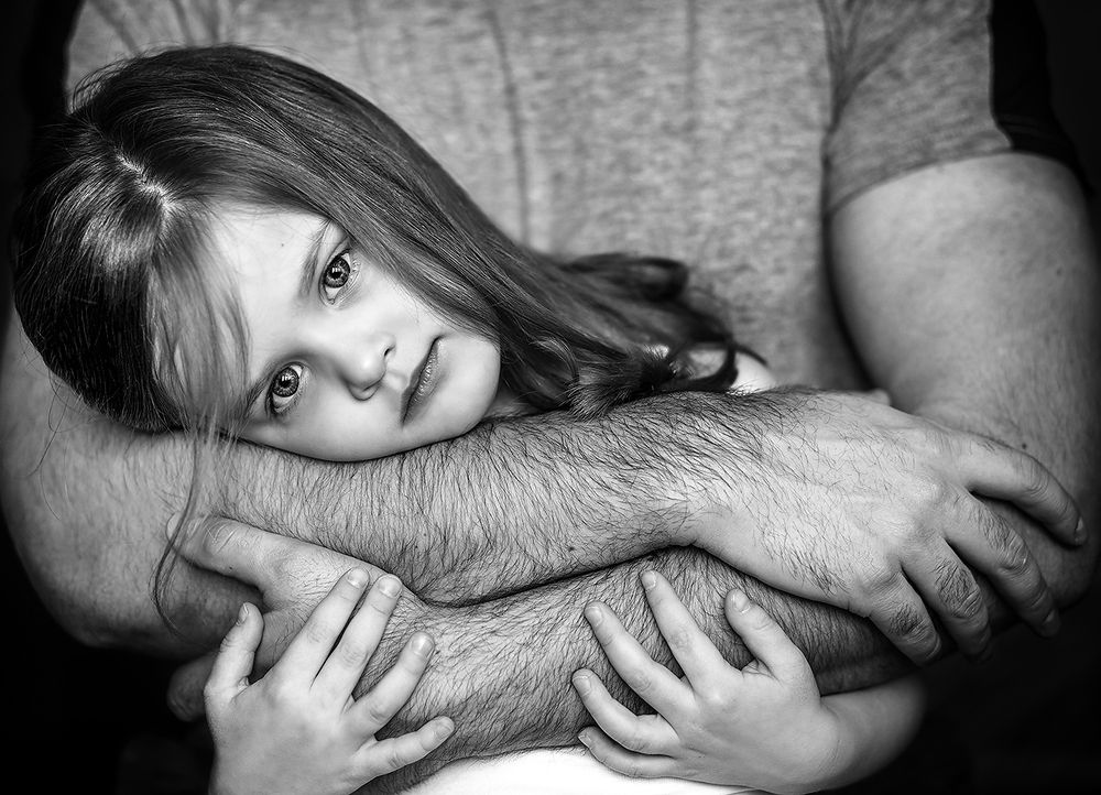 No fear in dad's arms.