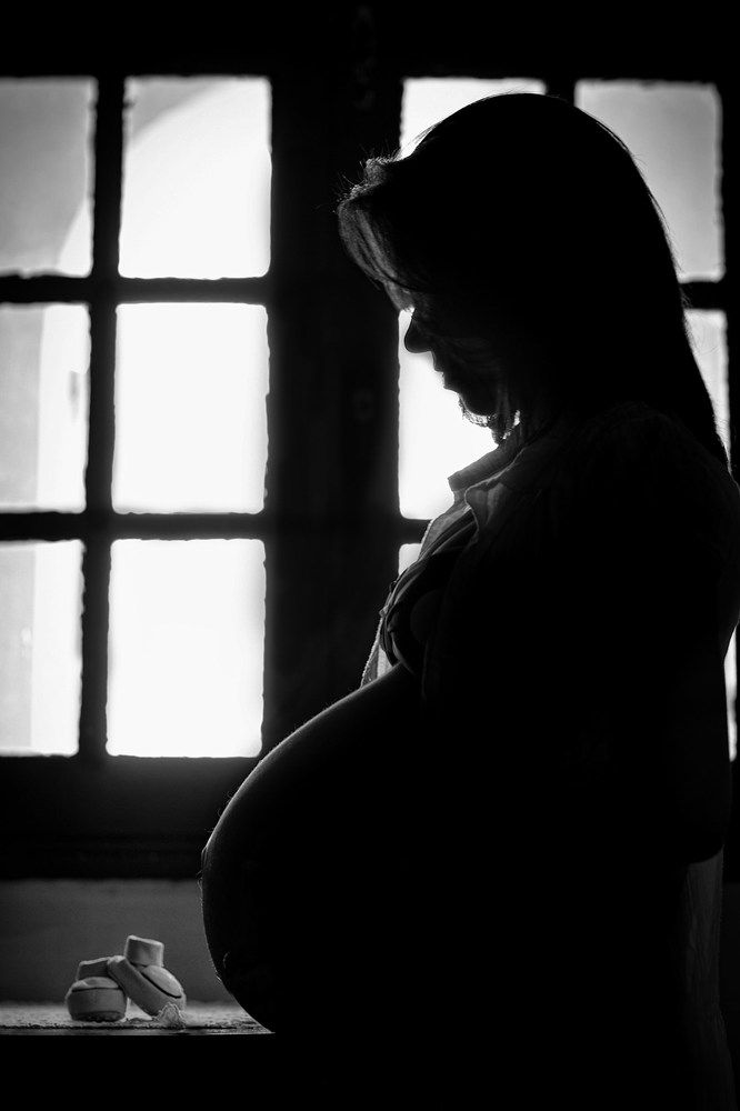 Pregnant and the baby shoes