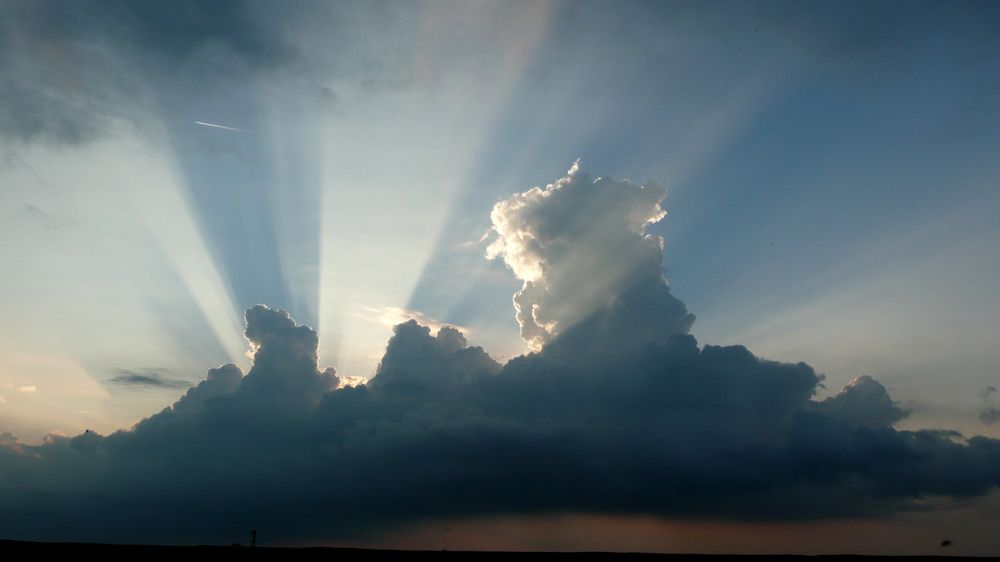 Wonderful sun light behind clouds