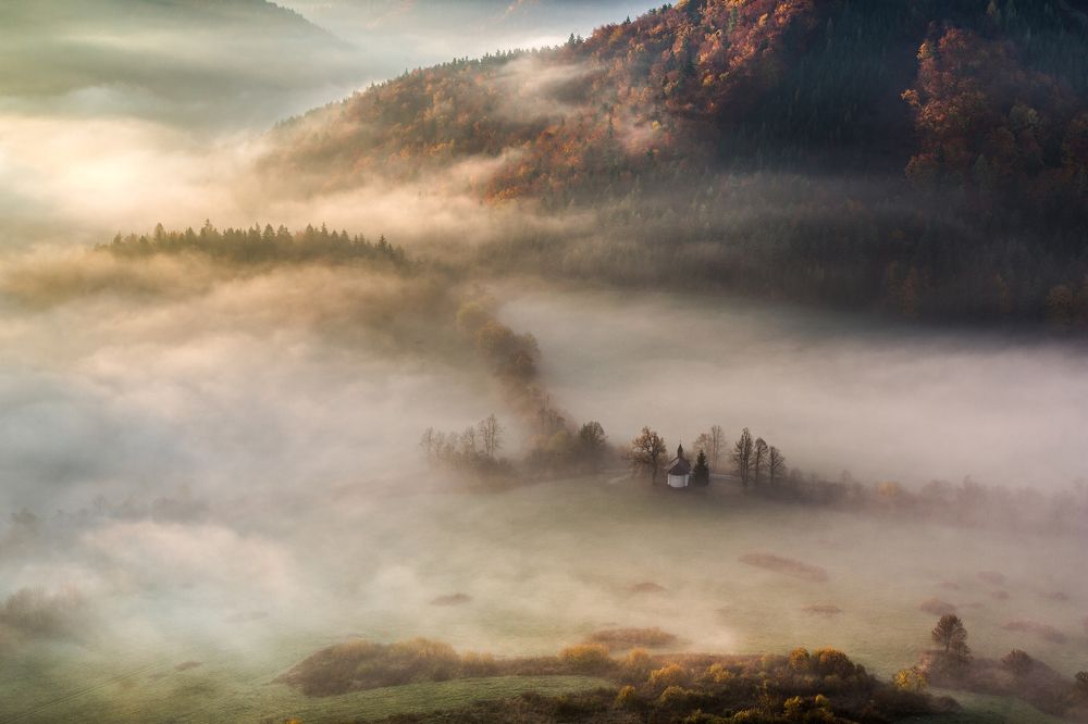 Chapel in the autumn valley
