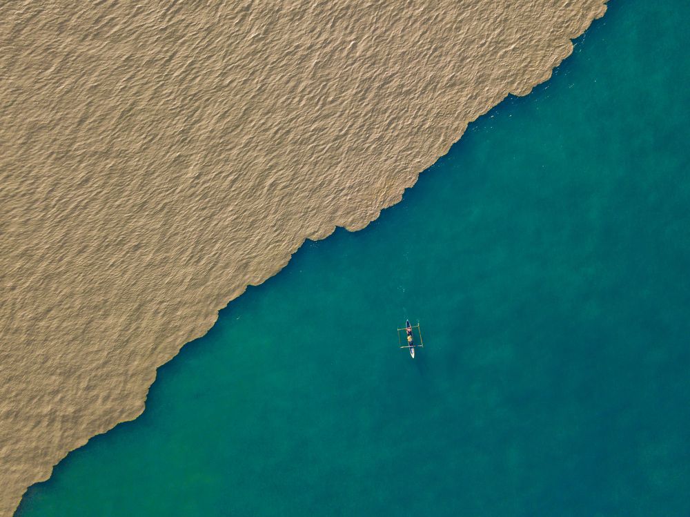 Where the muddy river meets the ocean