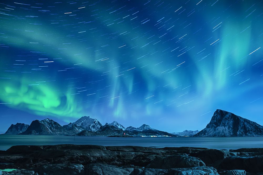 Northern lights and star tracks, Lofoten Islands