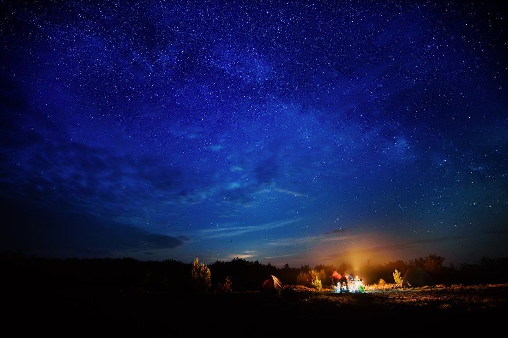 Camping under starry sky
