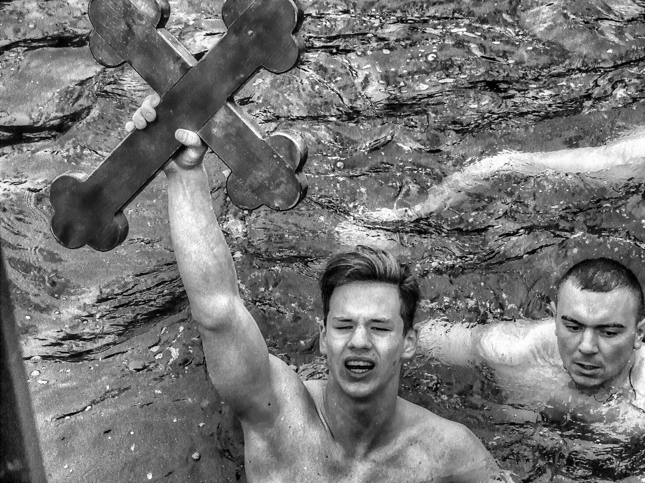 Swimming for the Holy Cross