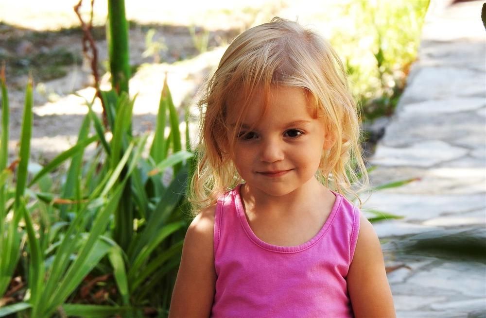 Pink princess with Mona Lisa smile