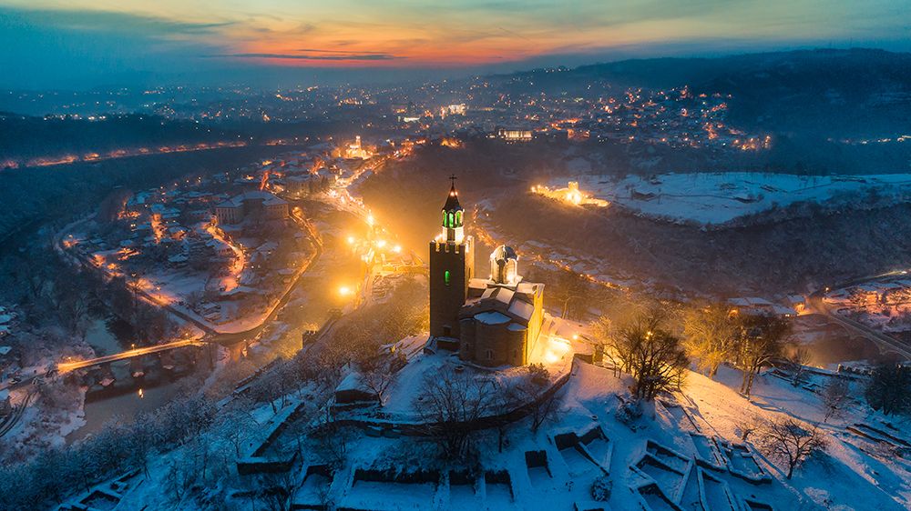 Night city lights over Veliko Tarnovo