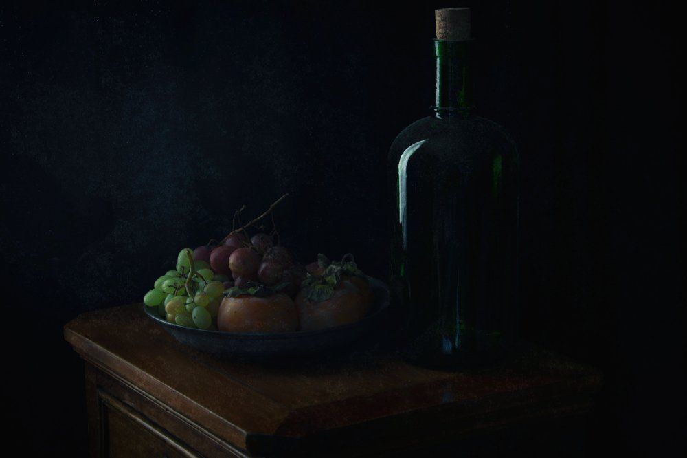 Green bottle and fruits