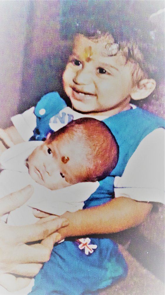 A little angel & a mischievous baby