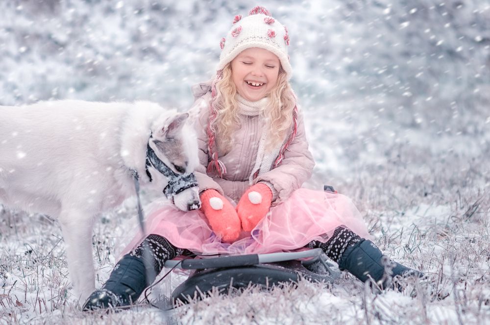 frosty cheeks of a little smiling girl