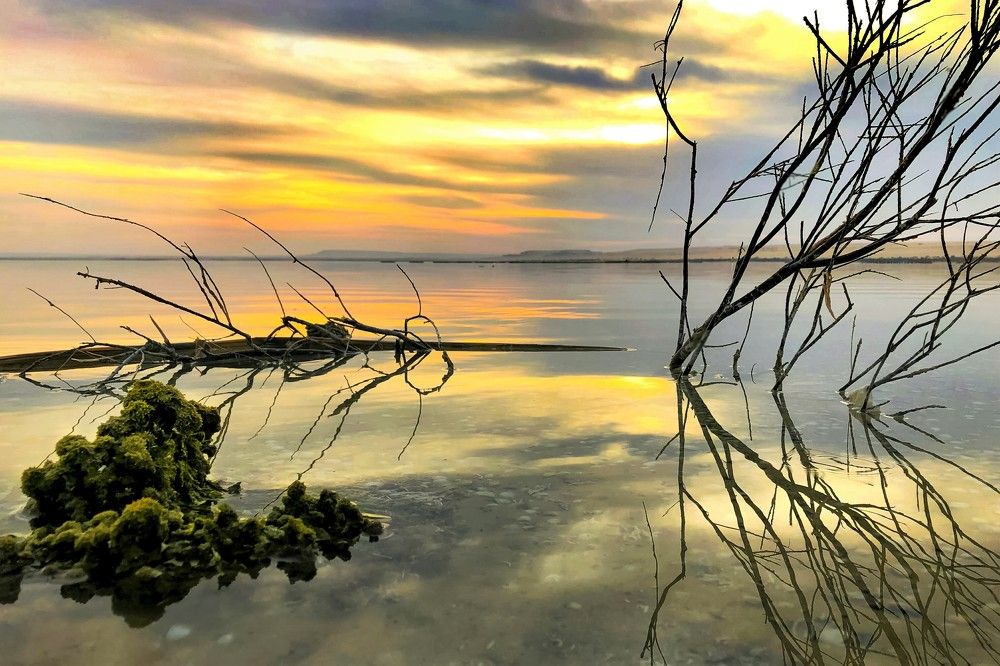 Sunset and water reflexion