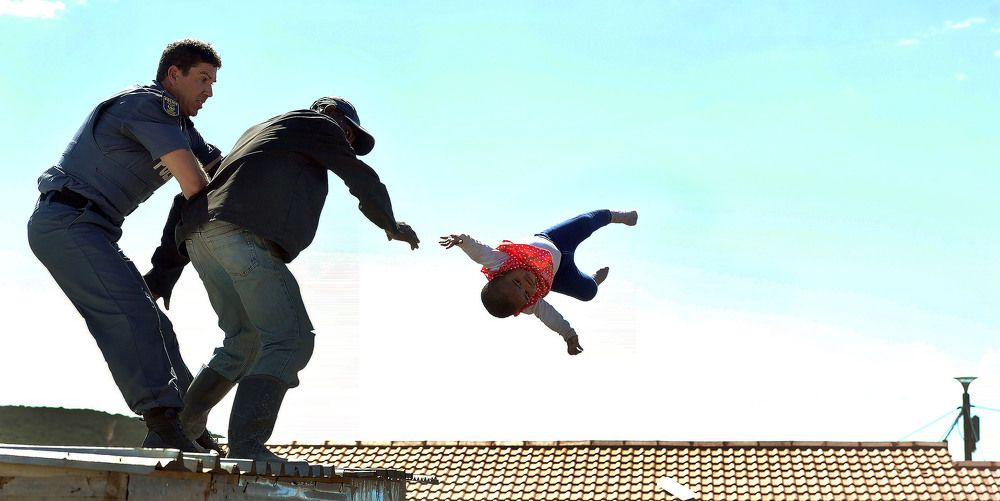 Father throws a baby