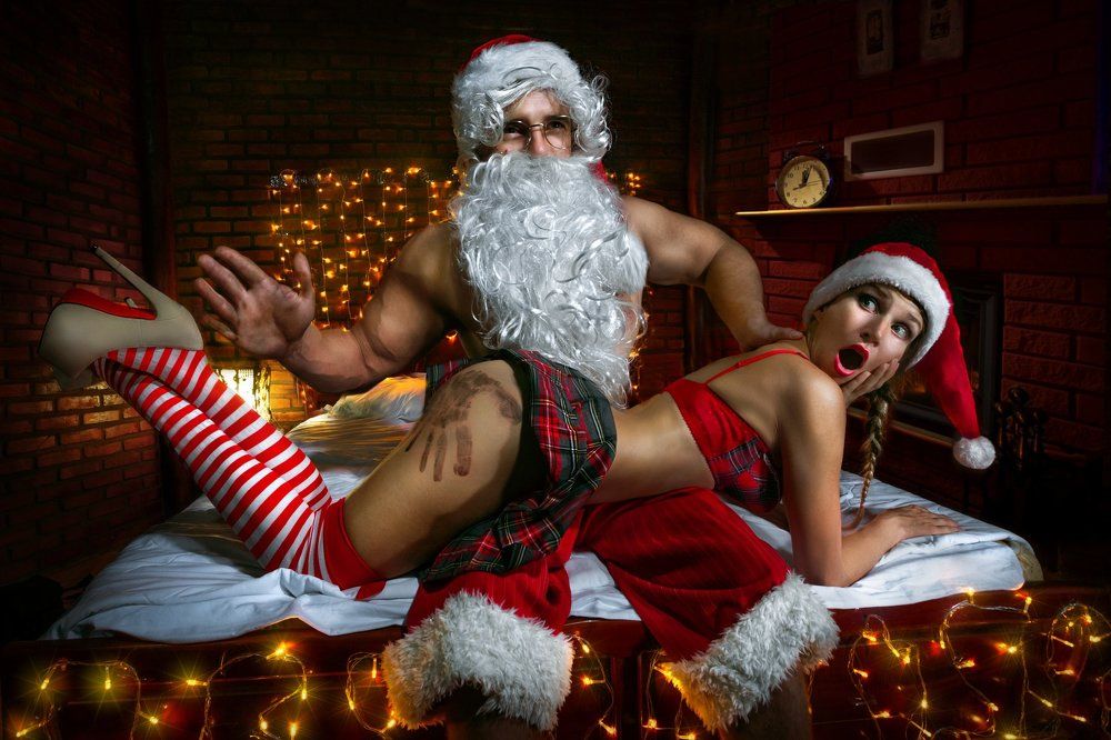 Santa Claus with sexy girl