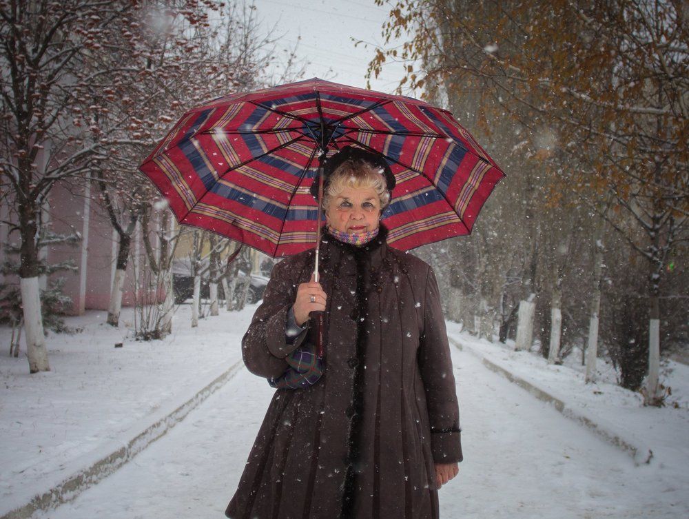 Женщина с зонтом.