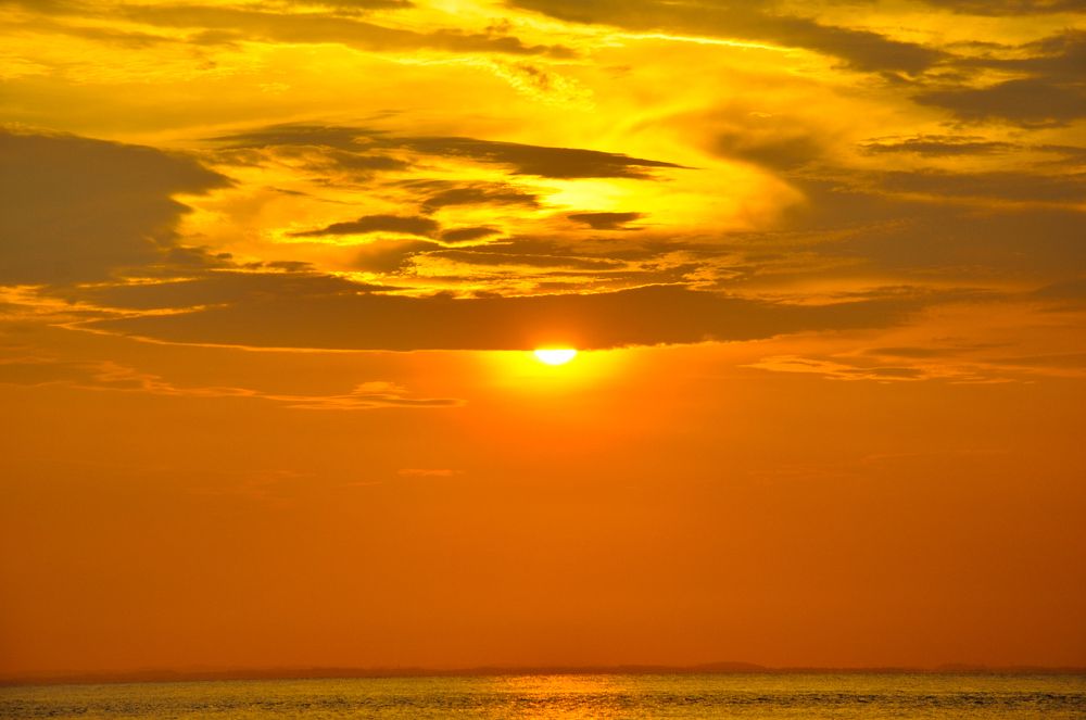Sunset and Unique Cloud