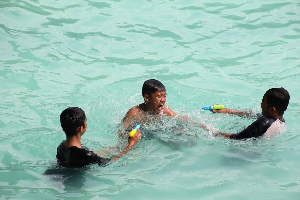 shoot friends with a water gun