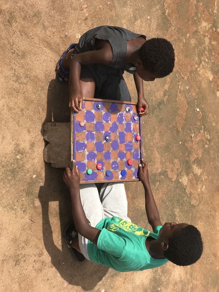 We create our game, we argue on who will win and we play.