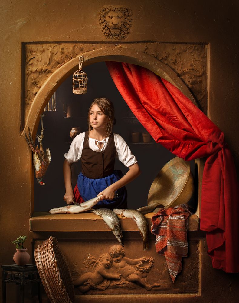 Young girl scrubbing fish