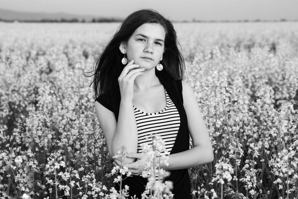Girl on colza field