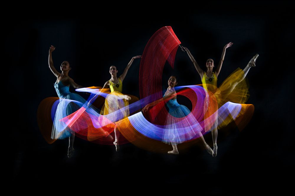 duo balerinas dance with lighting