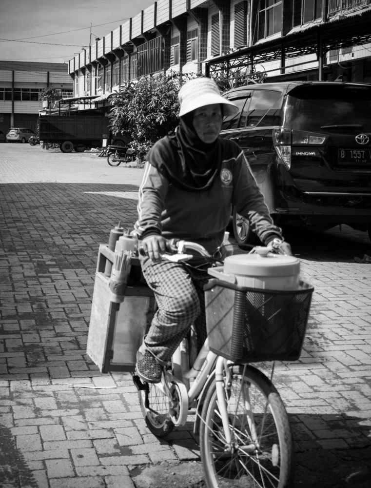 a old women selling Herb