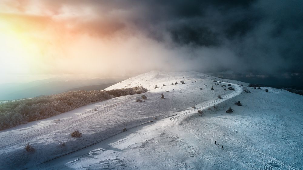 Low clouds in the snow mountain.