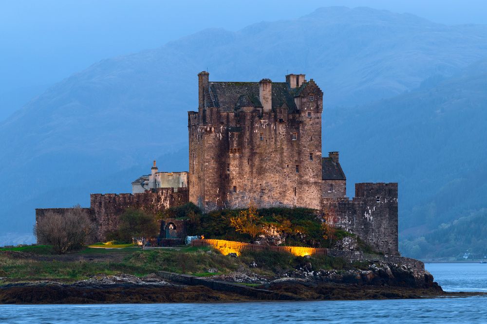Dusk falls beside Scottish castle