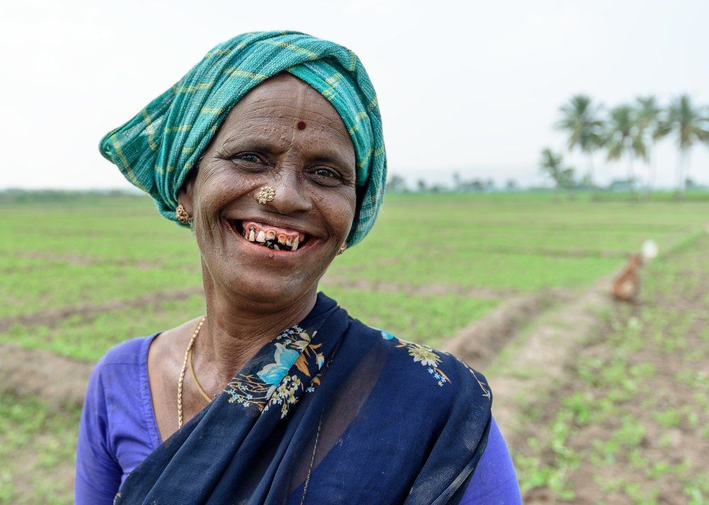 Priceless Smile of a farming lady